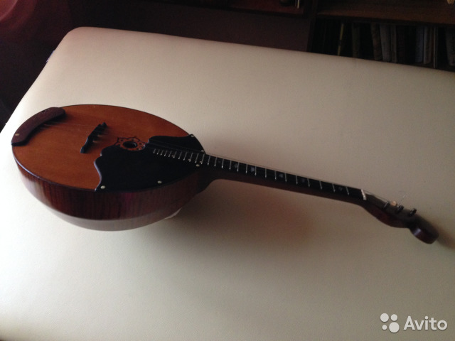 Vintage Bowl Back Mandolin... and on the right an unknown Montgomery Ward 'mando